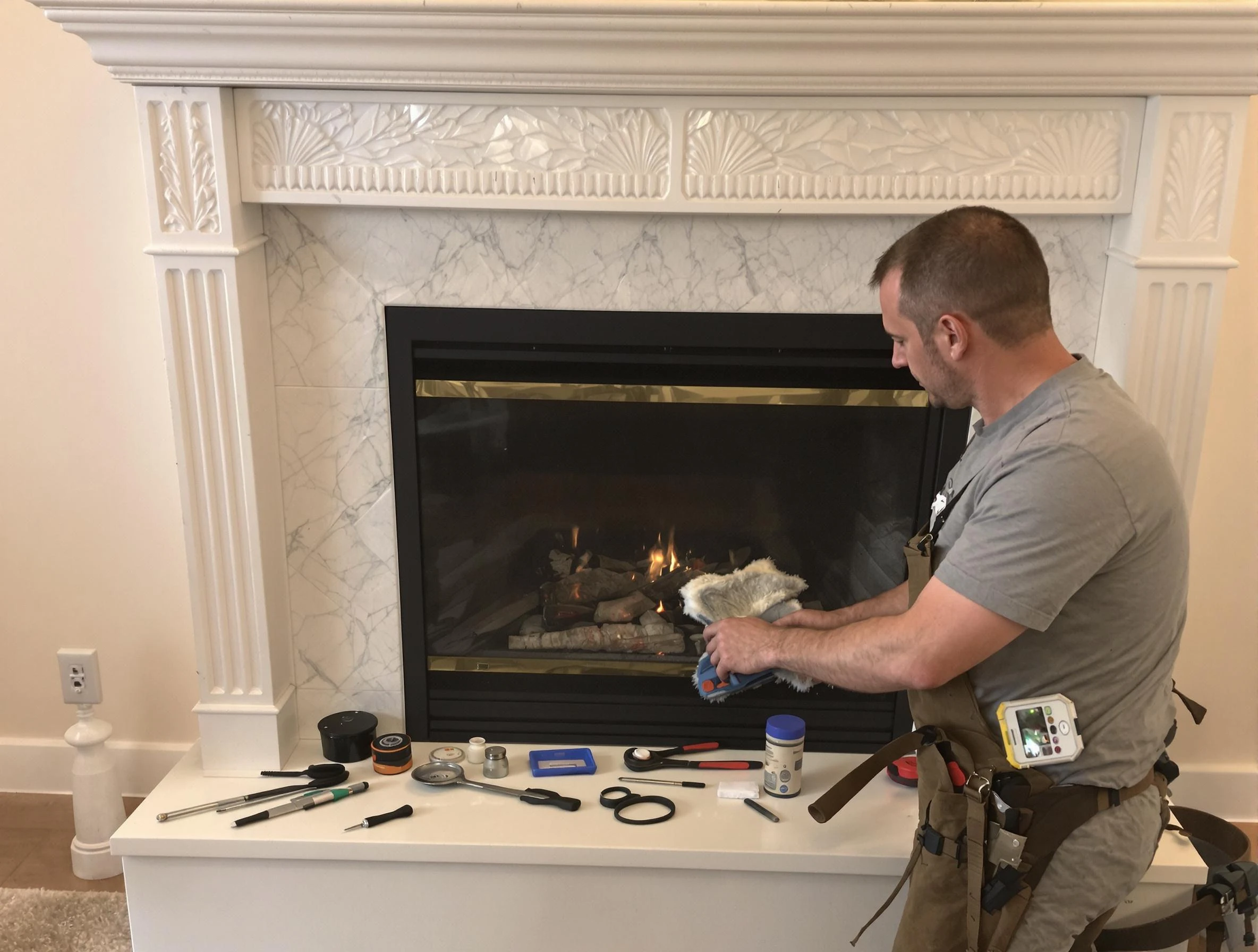 Tyrone Chimney Sweep performing fireplace maintenance in Tyrone, GA